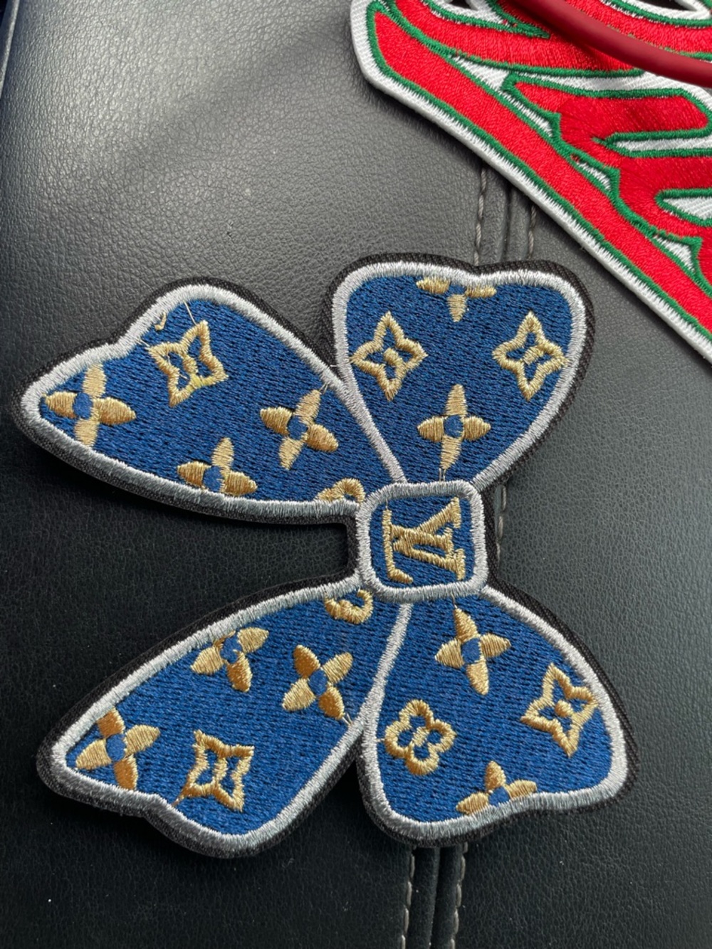 Embroidered Blue Bow Patch with Gold Motifs